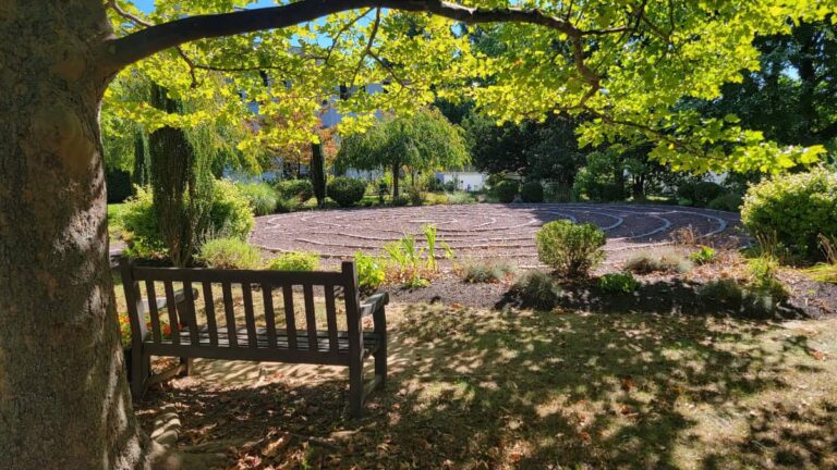 A bench sits next to the labyrinth in Doylestown