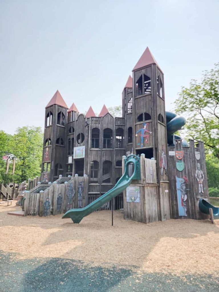 Looking at Kids Castle in Doylestown from the side shows some of the slides coming out of the castle