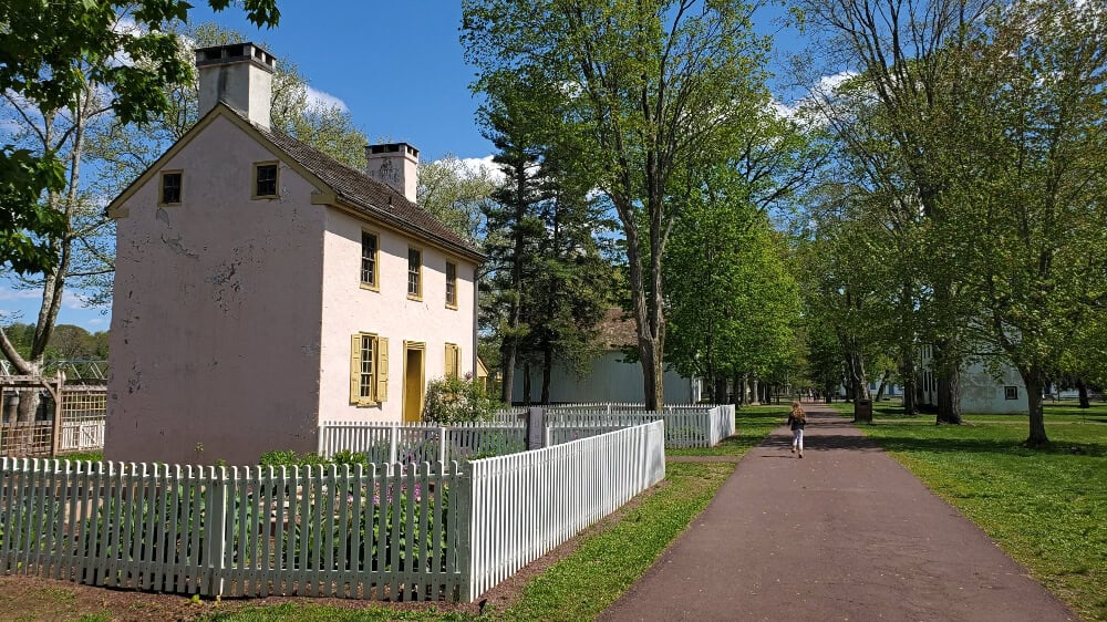 looking down a path at Washington Crossing wth a historic home to the left