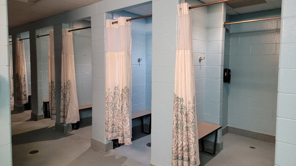Looking at multiple changing rooms inside Camelback Aquatopia