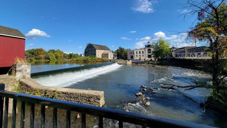 Looking across a river towards the Hunterdon Art Museum from the Red Mill Museum